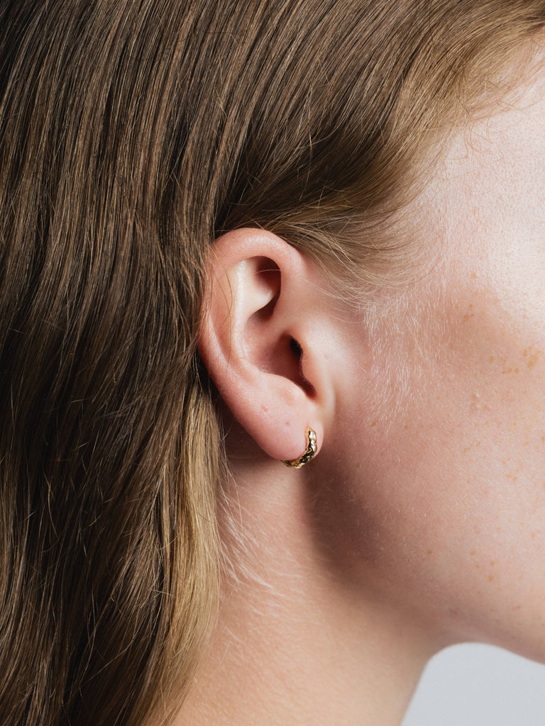 Organic Huggie Hoops (Gold) by Wolf Circus