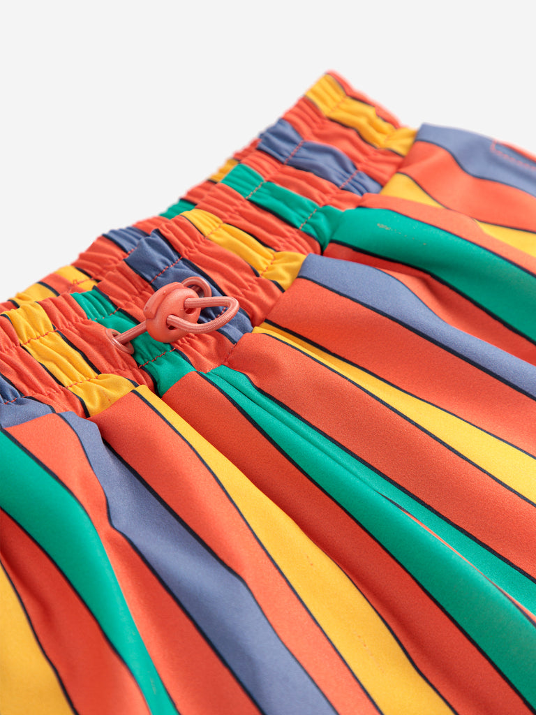 Multicolor Stripes Swim Board Shorts (Kids) by Bobo Choses