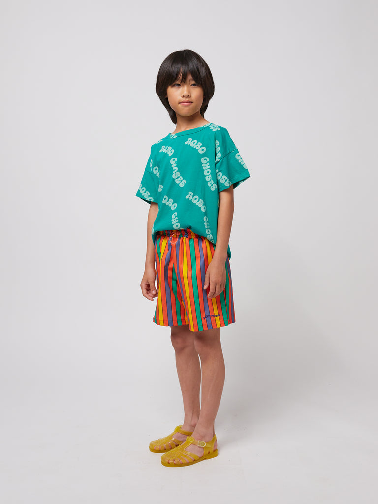 Multicolor Stripes Swim Board Shorts (Kids) by Bobo Choses