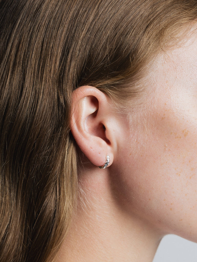 Organic Huggie Hoops (Silver) by Wolf Circus