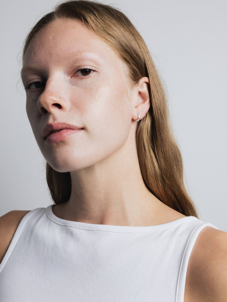 Organic Huggie Hoops (Silver) by Wolf Circus